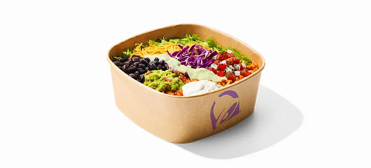 Veggie Bowl: A bowl filled with seasoned rice, black beans, lettuce, shredded purple cabbage, freshly prepared pico de…