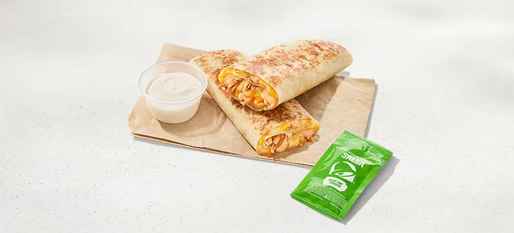 Cantina Chicken Rolled Quesadilla: A warm flour tortilla filled with savory slow-roasted chicken, a melty blend of…