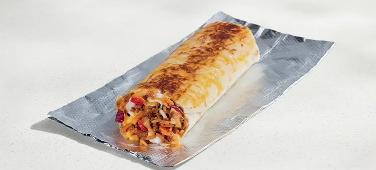Grilled Cheese Burrito: A warm flour tortilla with seasoned beef, warm Nacho Cheese sauce, seasoned rice, crunchy fiesta…