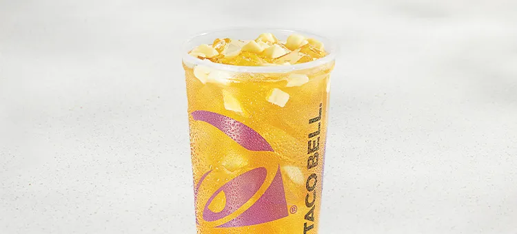 Mango Peach Agua Refresca: A light and refreshing beverage crafted with tropical mango and juicy peach flavors, real…