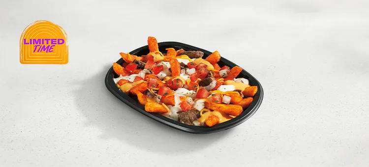 Chicken Fajita Nacho Fries: Golden, crisp Nacho Fries topped with savory, slow-roasted chicken, boldly…