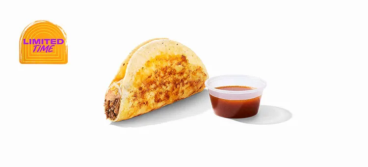 Shredded Beef Dipping Taco: A crunchy white corn tortilla with a grilled cheese crust on the outside, filled with…
