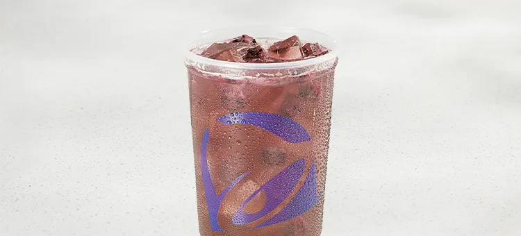 Dragonfruit Berry Limonada: A light and refreshing beverage crafted with tropical dragonfruit and mixed berry flavors, real…