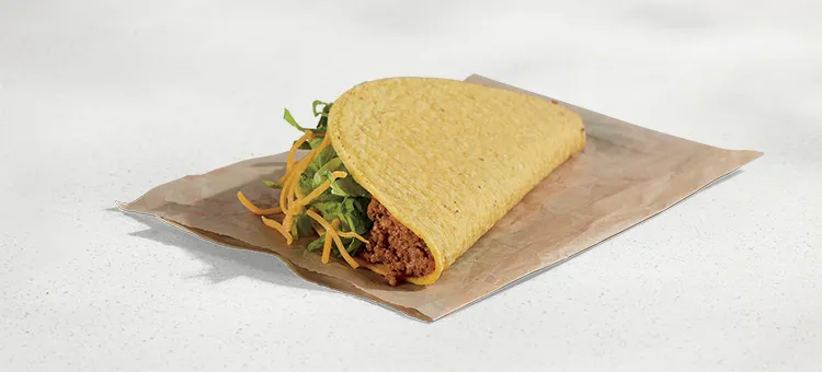 Crunchy Taco: A crunchy taco shell filled with seasoned beef, lettuce, and shredded cheddar cheese.