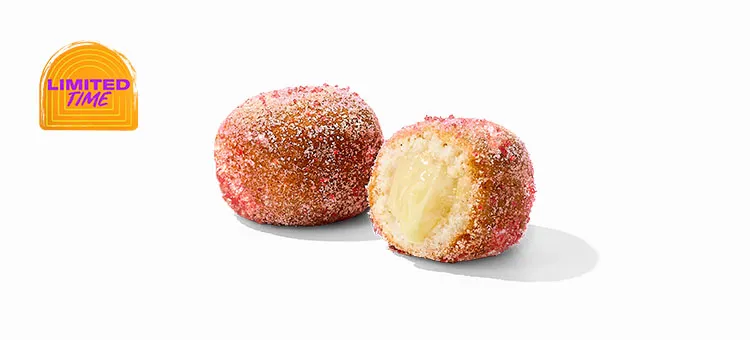 Strawberry Cinnabon Delights® 2pk: Two warm donut holes dusted in strawberry-flavored sugar and filled with Cinnabon®…