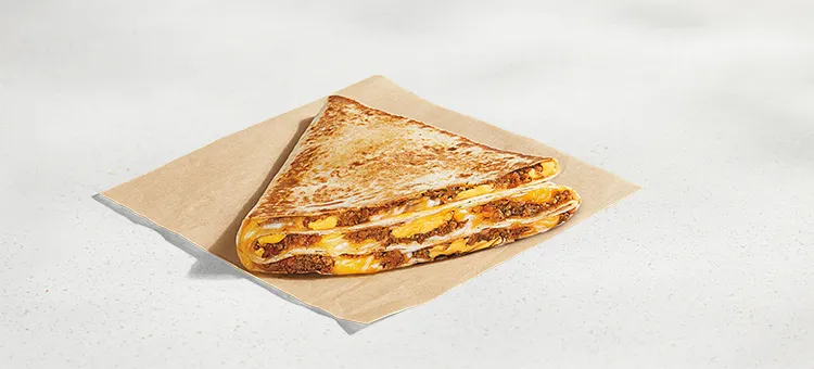 Stacker: A warm flour tortilla filled with seasoned beef, a blend of mozzarella, pepperjack, and cheddar cheeses, and warm…
