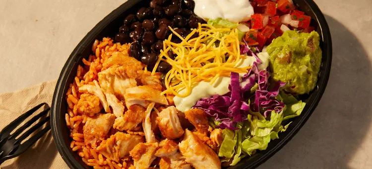 Cantina Chicken Bowl: Savory, slow-roasted chicken, seasoned rice, slow-simmered black beans, Avocado Ranch sauce…