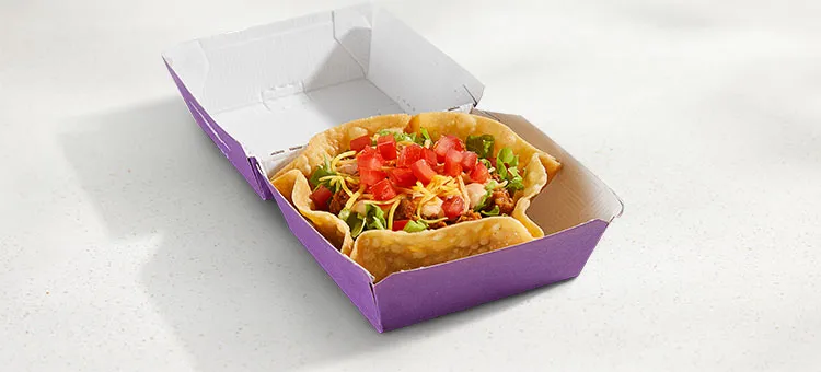 Mini Taco Salad: A new take on a classic, featuring seasoned beef, Chipotle Sauce, cheddar cheese, lettuce, tomatoes, and…