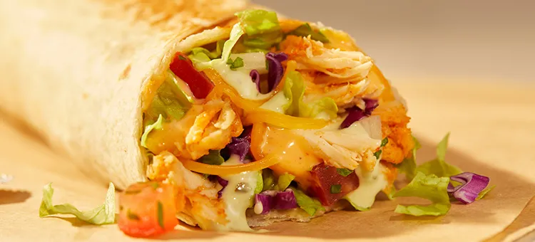 Cantina Chicken Burrito: A warm flour tortilla filled with double the savory, slow-roasted chicken*, Avocado Ranch & Creamy…