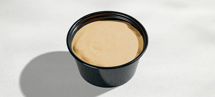Jalapeño Ranch Sauce: A savory and creamy sauce made with a signature blend of spices for hint of spice.