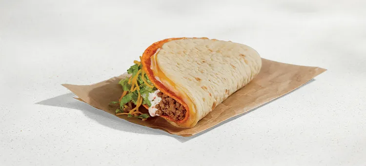 Doritos® Cheesy Gordita Crunch - Nacho Cheese: A warm, pillowy flatbread filled with a blend of mozzarella, pepperjack, and…