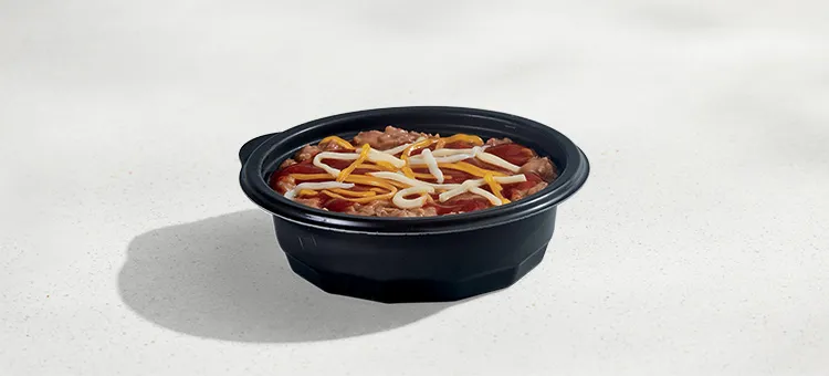 Pintos N Cheese: Refried Beans with Red Sauce and a blend of mozzarella, pepperjack, and cheddar cheeses.
