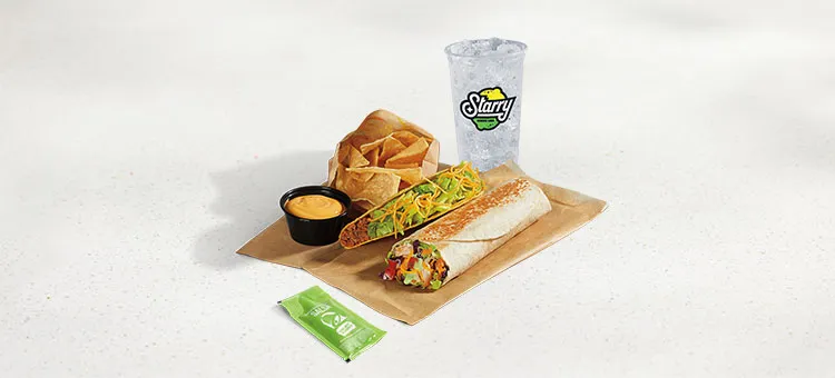 Cantina Chicken Burrito Combo: Includes a Cantina Chicken Burrito, an Avocado Verde Salsa packet, a Crunchy Taco, Chips &…