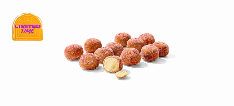 Strawberry Cinnabon Delights® 12pk: A dozen warm donut holes dusted in strawberry-flavored sugar and filled with Cinnabon®…