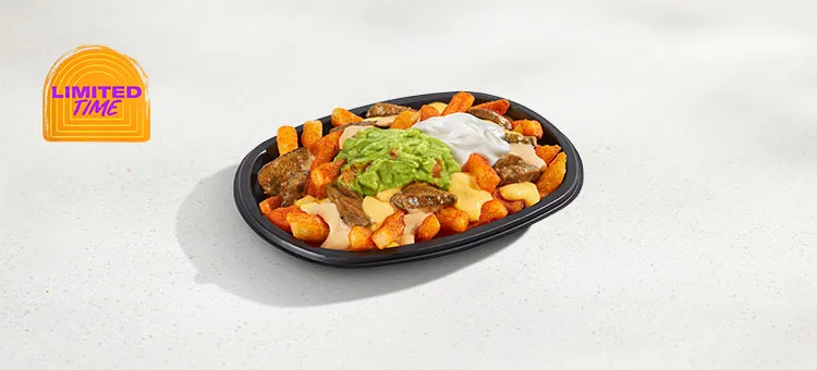 Steak & Guac Nacho Fries: Golden, crisp Nacho Fries topped with grilled, marinated steak, creamy chipotle sauce, warm nacho…