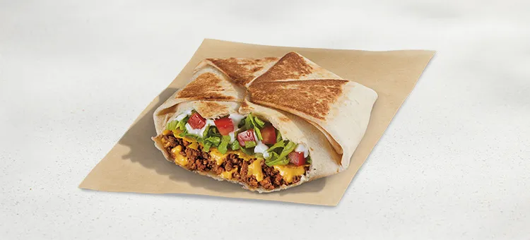 Crunchwrap Supreme®: A warm flour tortilla filled with seasoned beef, warm Nacho Cheese sauce, a crispy tostada shell…