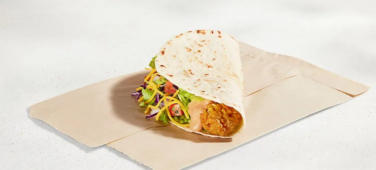 Creamy Chipotle Crispy Chicken Soft Taco: A warm flour tortilla filled with premium all-white-meat, marinated chicken…