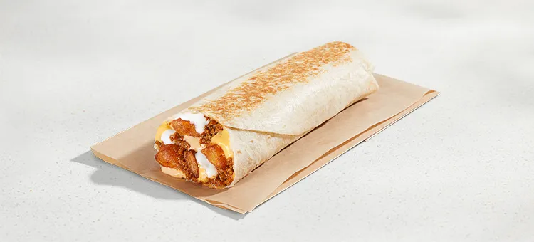 Beefy Potato Loaded Griller: A grilled roll-up filled with seasoned beef, crispy potato bites, nacho cheese sauce, Chipotle…